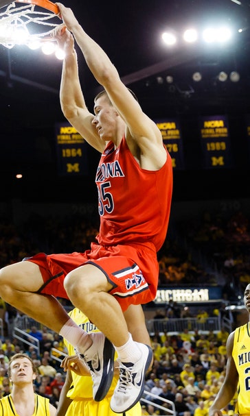 Arizona overcomes early start, Michigan for huge win